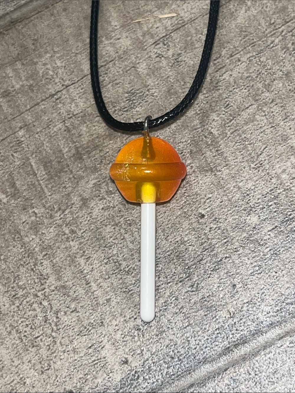 Unbranded Orange Lollipop Pendant Necklace on Black Cord